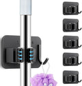 5 Pack Heavy Duty Mop and Broom Holder Wall Mount, No Drill Self Adhesive Stainless Steel Hanger with Hooks, Anti-Slip Tool Organizer for Bathroom, Kitchen, Garage, Laundry Room (5, Black)