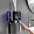 Toothbrush Holders for Bathrooms, Wekity Automatic Toothpaste Dispenser Space Saving Toothbrush and Toothpaste Holder，Toothbrush Holder Wall Mounted with 2 Cups for Bathroom (Black)…
